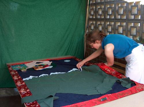 Naljorma Rin’dzin working on a thangka