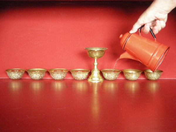 filling the offering bowls